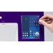 Person using a sewing machine's touch screen interface with a pen.