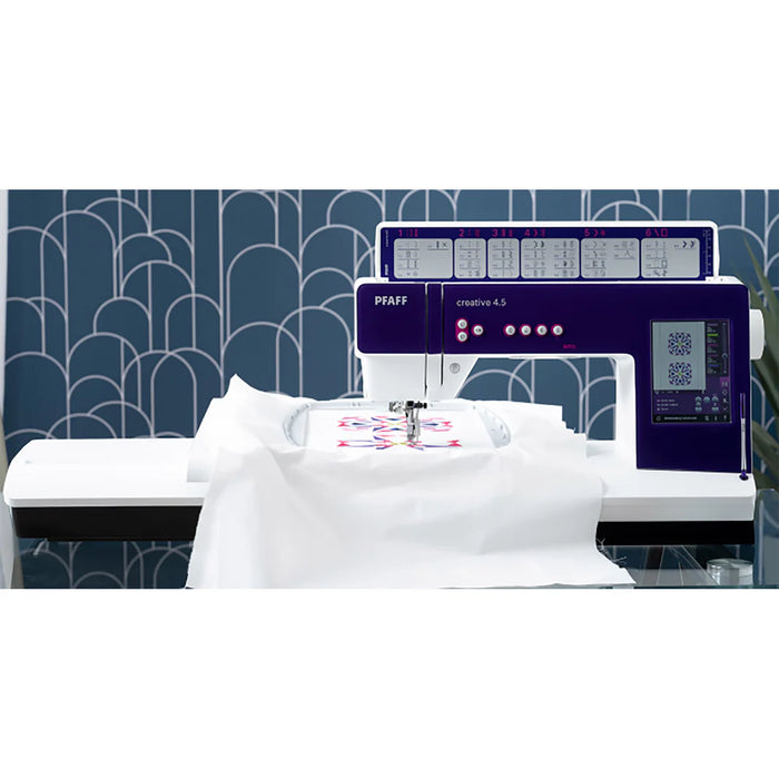 Sewing machine with a blue patterned wall in the background
