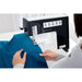 Person using a Pfaff sewing machine on blue fabric