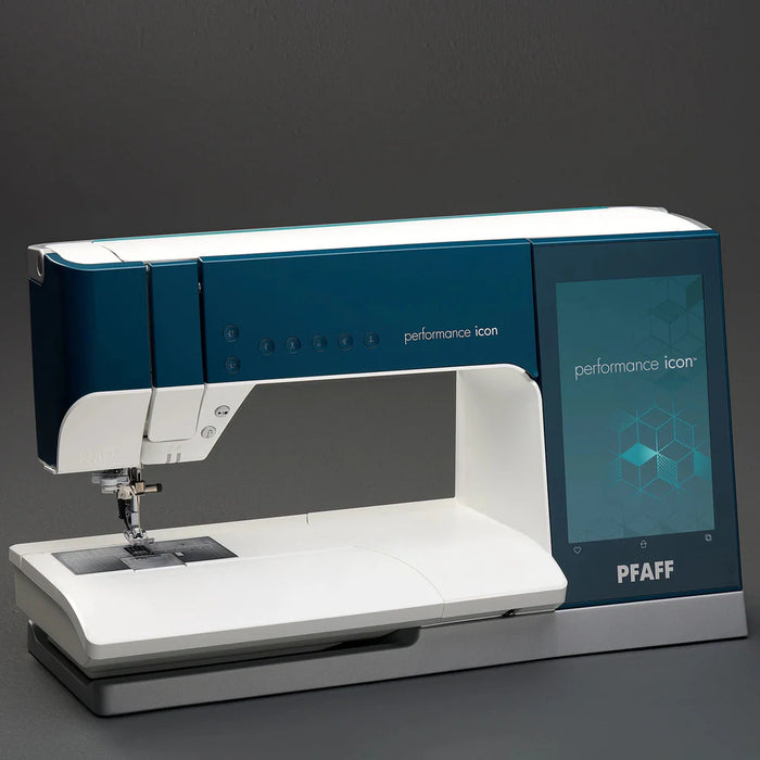 PFAFF sewing machine on a dark background