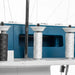 Spools of thread on a sewing machine with a blue background