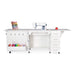 Arrow Harriet 311 White Sewing Cabinet fully opened with sewing machine, thread racks, embroidery hoop hooks, and extended workspace.