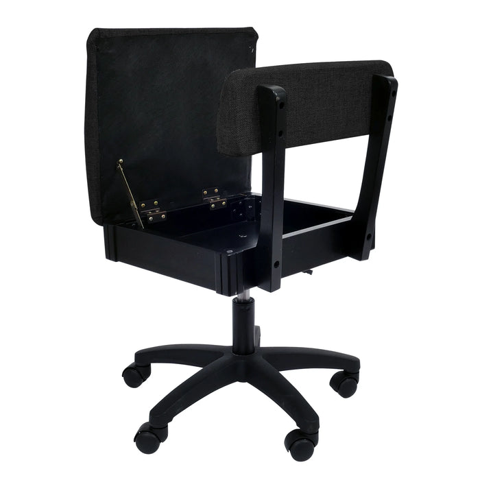 Arrow Baroness Black Hydraulic Sewing Chair – open storage seat compartment with empty interior, featuring durable black fabric upholstery.