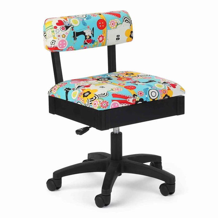 Arrow Sew Wow Hydraulic Sewing Chair – front angle view with colorful sewing-themed upholstery, ergonomic backrest, and height-adjustable swivel base.
