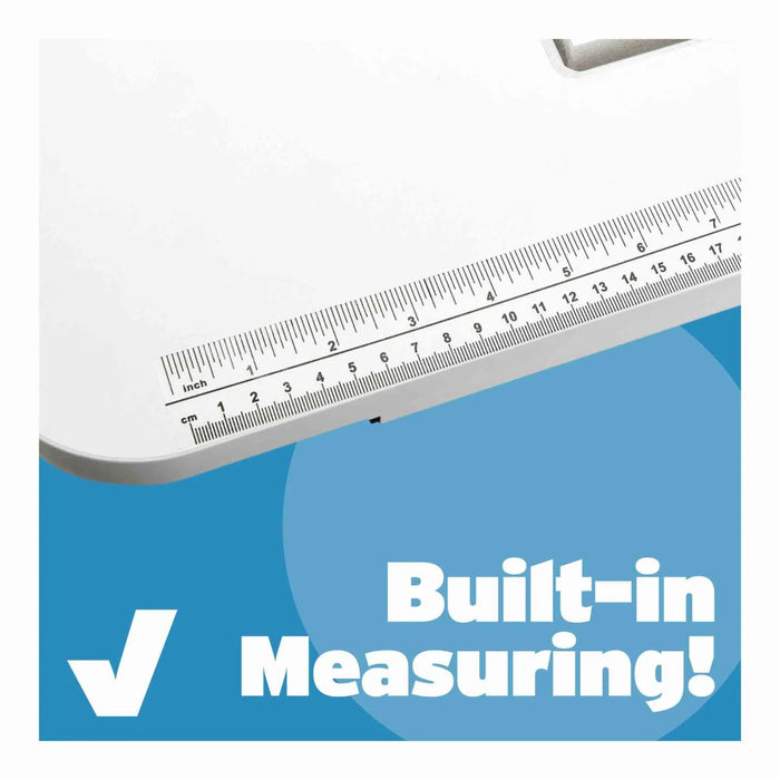 Built-in measuring decal on Arrow Gidget I Sewing Table 601 showing inch and centimeter markings for precise sewing work.