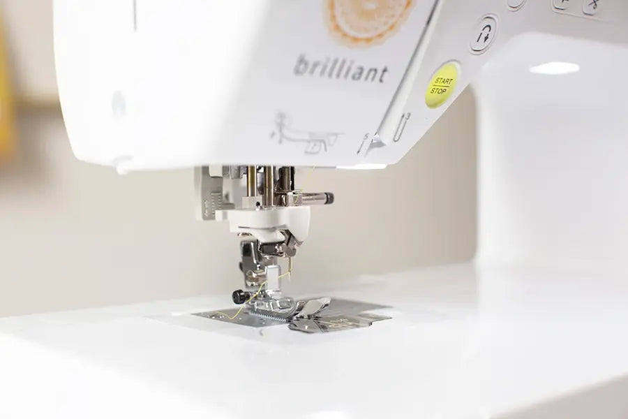 Baby Lock Brilliant sewing machine advanced needle threader and presser foot detail