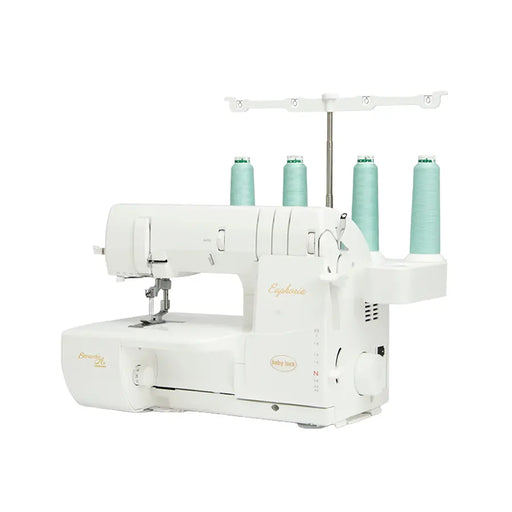 Baby Lock Euphoria BLC4 Cover Stitch Machine angled view showing thread stand, stitch controls, and wide workspace.
