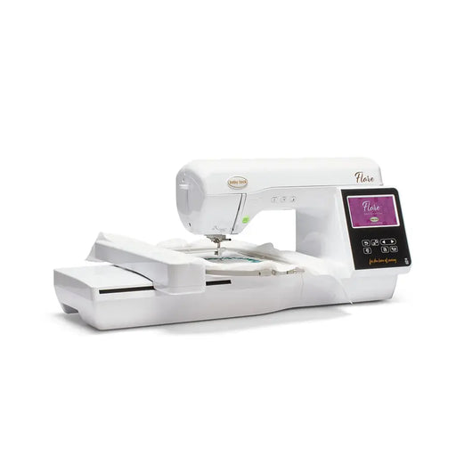 Side view of the Baby Lock Flare BLMFL embroidery machine stitching a design in the extended 6x10 hoop area.