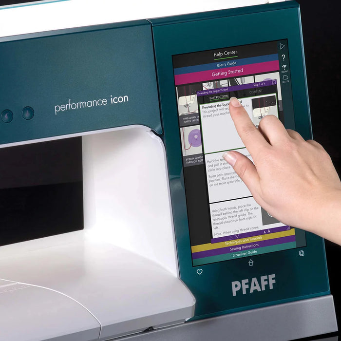 PFAFF sewing machine with a hand interacting with the touchscreen interface