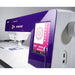 Sewing machine with a purple display panel on a white background