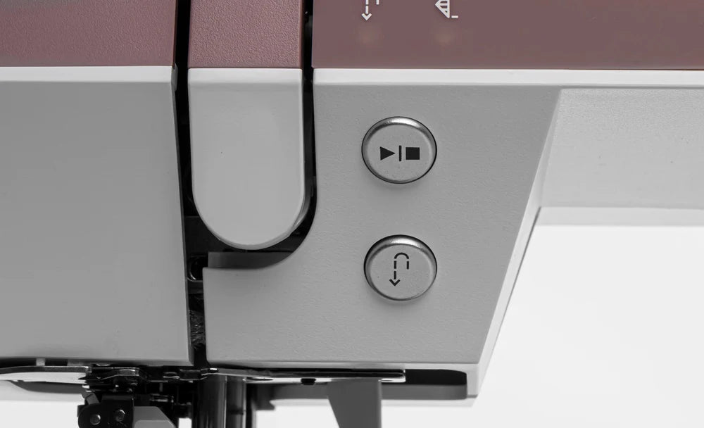 Close-up of a sewing machine with control buttons on a white background