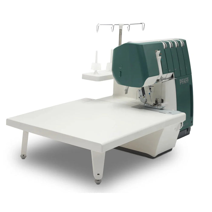 Serger sewing machine with a white table on a white background