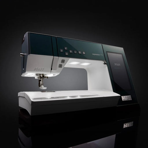 Sewing machine with digital display on a black background