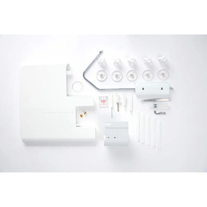 White sewing machine on a white background
