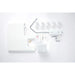 White sewing machine on a white background