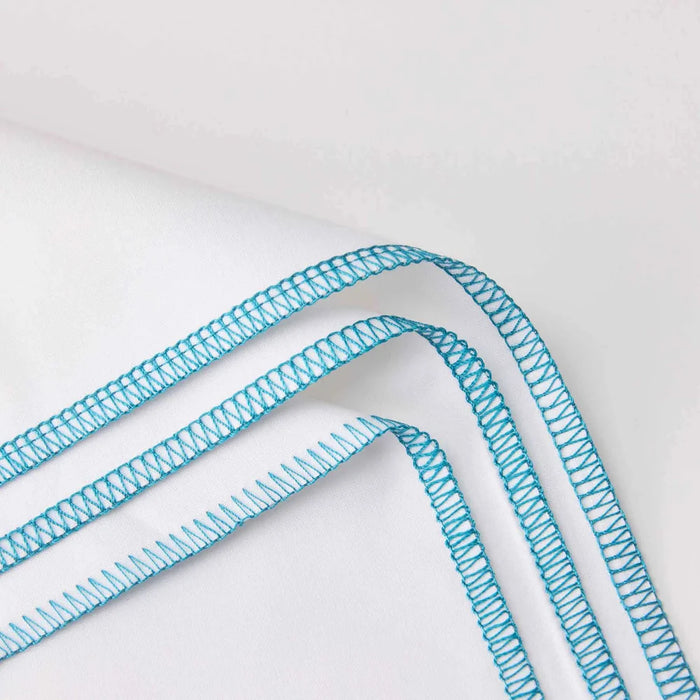 Blue ribbon with a textured pattern on a white background