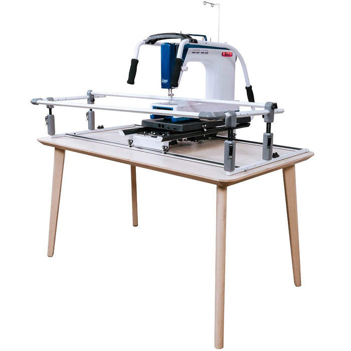 Grace Cutie Breeze tabletop quilting frame with midarm quilting machine mounted on a table