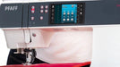 Sewing machine with digital display and control panel, featuring the PFAFF brand.