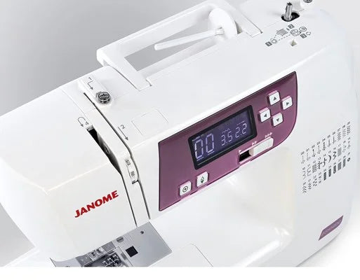 Top view of the Janome 2030DC-G sewing machine showing digital stitch display, navigation buttons, and thread path.