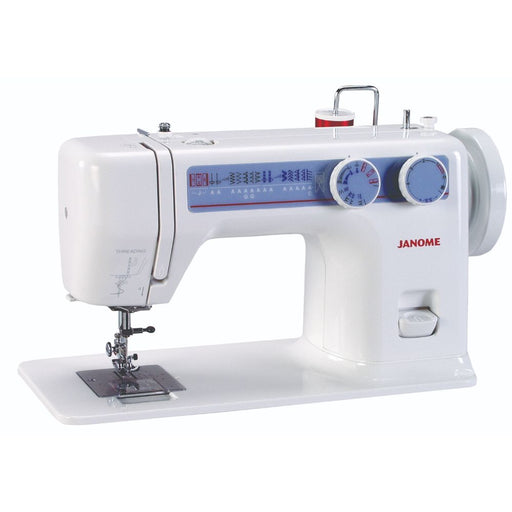 Janome 712T treadle sewing machine front angle view showcasing stitch selection panel, handwheel, and flatbed design.