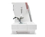 Side profile of the Janome Horizon Memory Craft 9410QC highlighting needle mechanism and free arm design.