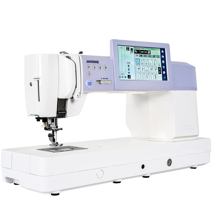 Angled view of Janome Continental M6 quilting machine showcasing LCD touchscreen, stitch controls, and extended 13.71-inch flatbed.