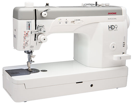 Angled view of Janome HD9V2 Professional Heavy Duty Sewing Machine highlighting extended workspace and precision engineering.