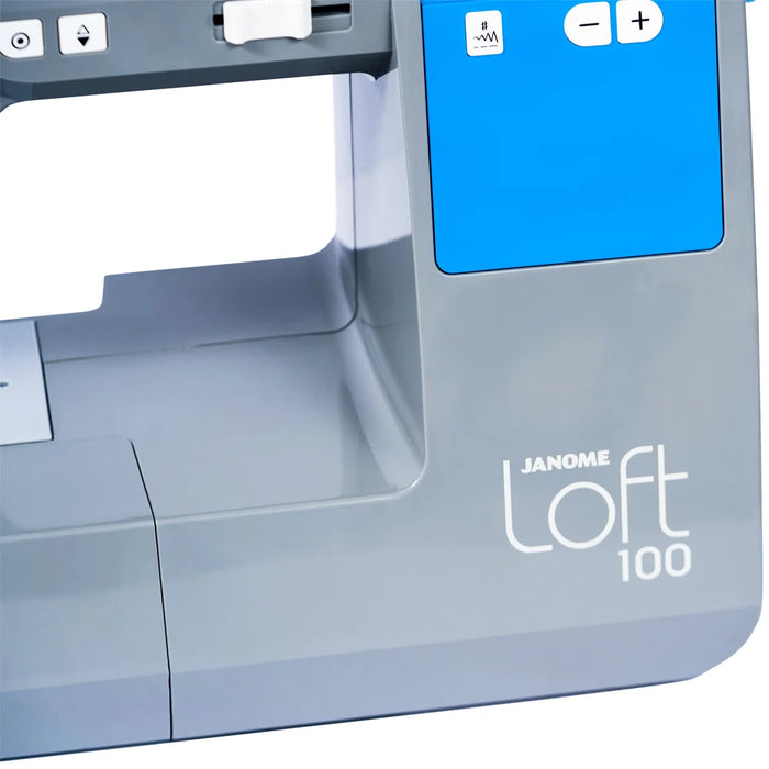 Detailed view of Janome Loft 100 sewing machine arm and blue digital control panel branding