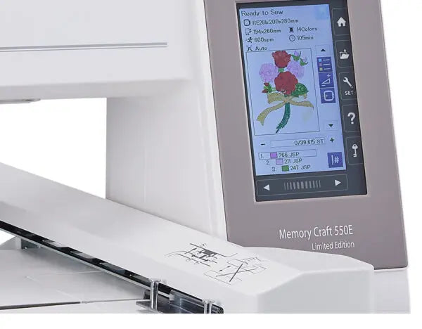 Close-up of Janome MC550E Limited Edition touchscreen displaying built-in embroidery designs and on-screen editing tools.