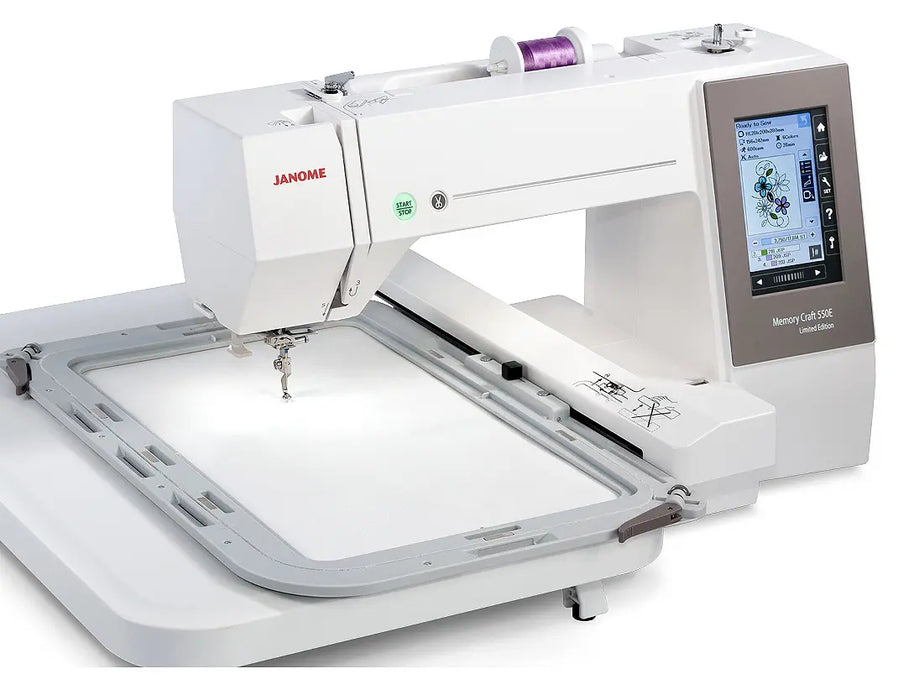 Janome Memory Craft 550E Limited Edition with large embroidery hoop attached, demonstrating spacious embroidery field for oversized projects.