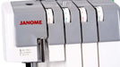 Close-up of Janome MyLock 454D serger tension dials with color-coded threading system for easy stitch adjustments.