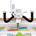 Janome Quilt Maker 15 long arm quilting machine side view showing 15-inch throat space and industrial quilting head