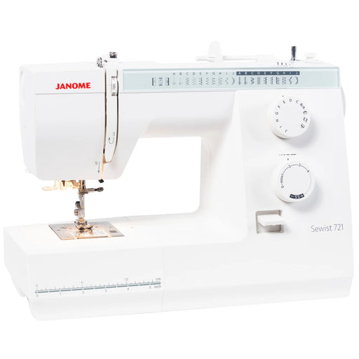 Janome Sewist 721S sewing machine angled view displaying stitch selection, dials, and spacious sewing bed for versatile fabric work.