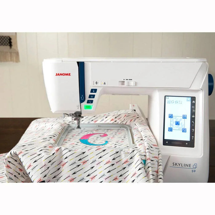 Janome Skyline S9 embroidery machine stitching monogram design with intuitive on-screen editing tools.