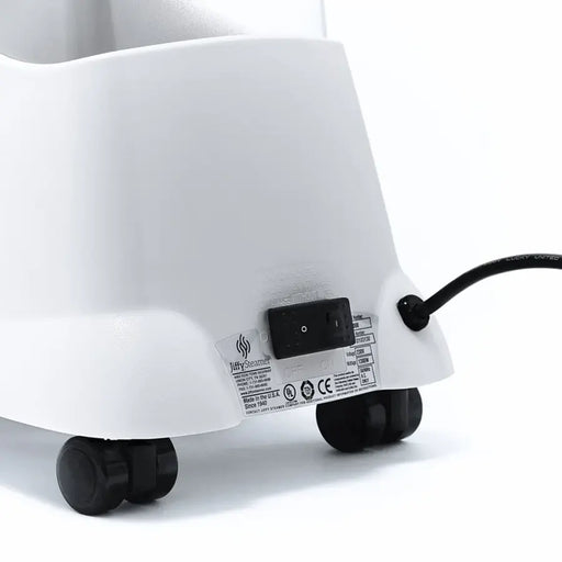 Rear view of the Jiffy 1201 J-2000H Hat Steamer showing power switch, caster wheels, and durable build for home or professional hat care.