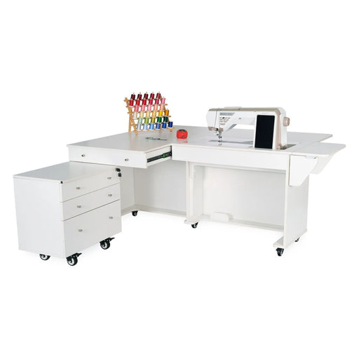 Kangaroo & Joey XL Sewing Cabinet in Ash White with extended workspace, hydraulic lift, and rolling storage drawers shown fully open with sewing machine setup.