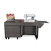 Kangaroo & Joey Dual Rail Electric Sewing Cabinet in gray finish with sewing machine and thread rack