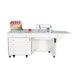 Front view of white Kangaroo & Joey electric sewing cabinet with machine lift opening visible
