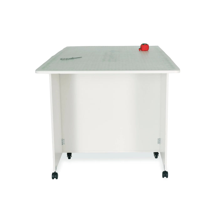 Rear view of Ash White Kangaroo Kookaburra Cutting Table featuring solid back panel and caster wheels for smooth mobility in sewing rooms.