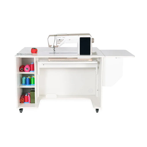 Kangaroo Melbourne XL Hydraulic Sewing Cabinet in Ash White with sewing machine installed, open workspace, thread storage shelves, and extended quilt leaf.