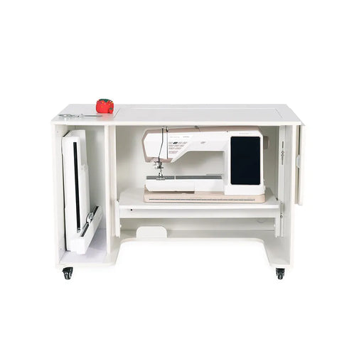 Kangaroo Melbourne XL Sewing Cabinet in Ash White shown with hydraulic lift lowering the sewing machine into storage position and side storage door open.