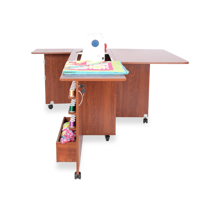 Side angle of Kangaroo Wallaby Sewing Cabinet K8405 in Teak showcasing spool storage and extended sewing workspace.