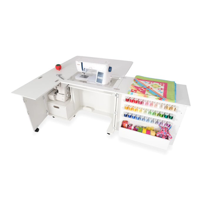 Top view of Kangaroo Wallaby Sewing Cabinet K8411 in White featuring extended quilt leaf, sewing machine surface, and serger compartment.