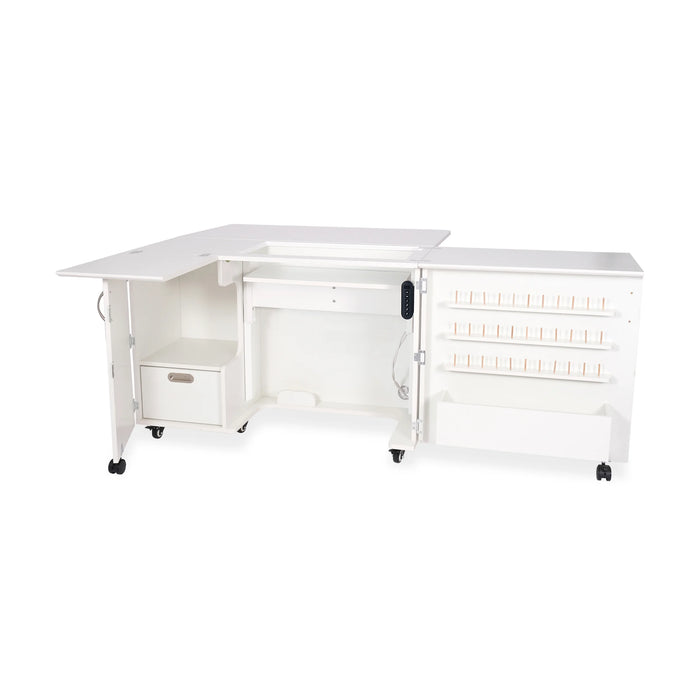 Empty White Wallaby Electric Sewing Cabinet showing storage drawers, serger space, and lift opening.