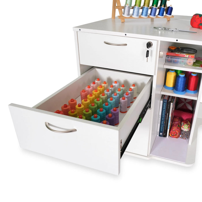 Kangaroo Sydney Lite XL white sewing cabinet open thread drawer showing colorful embroidery thread storage and organized craft supplies.