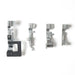 Set of four metal sewing machine presser feet on a white background