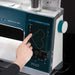 PFAFF sewing machine with digital display and hand interacting with it