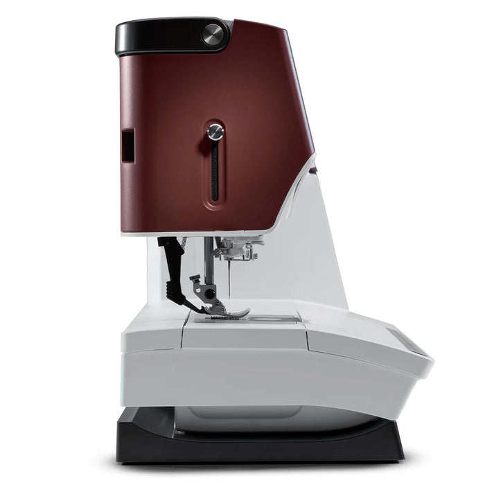 Sewing machine with a brown top and white body on a white background
