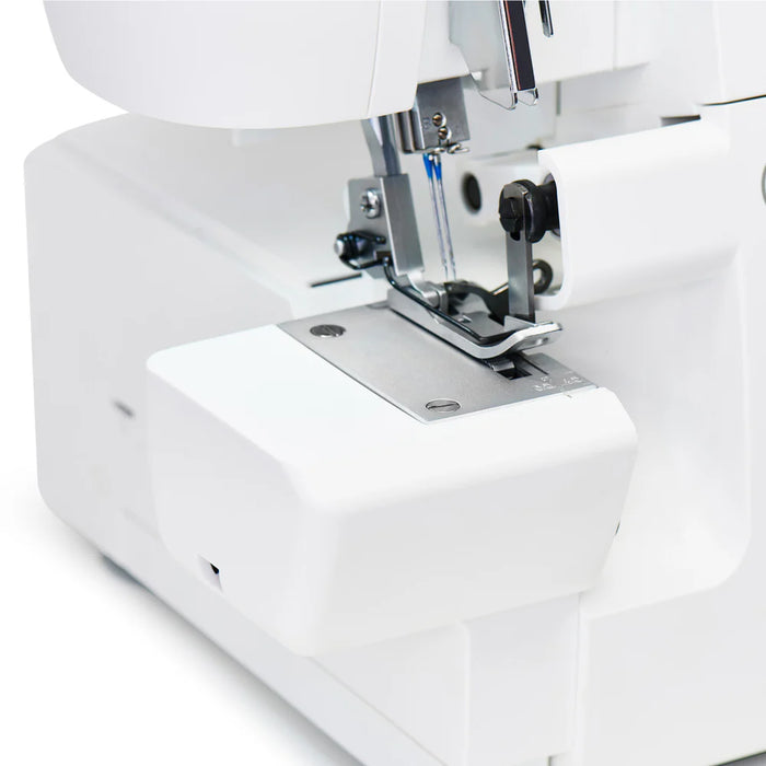 Close-up of SINGER SE017 Elite serger needle area and presser foot for precision overlock stitching and clean fabric edges