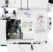 Open front view of SINGER SE017 Elite serger showing internal looper system and built-in threading guide diagram